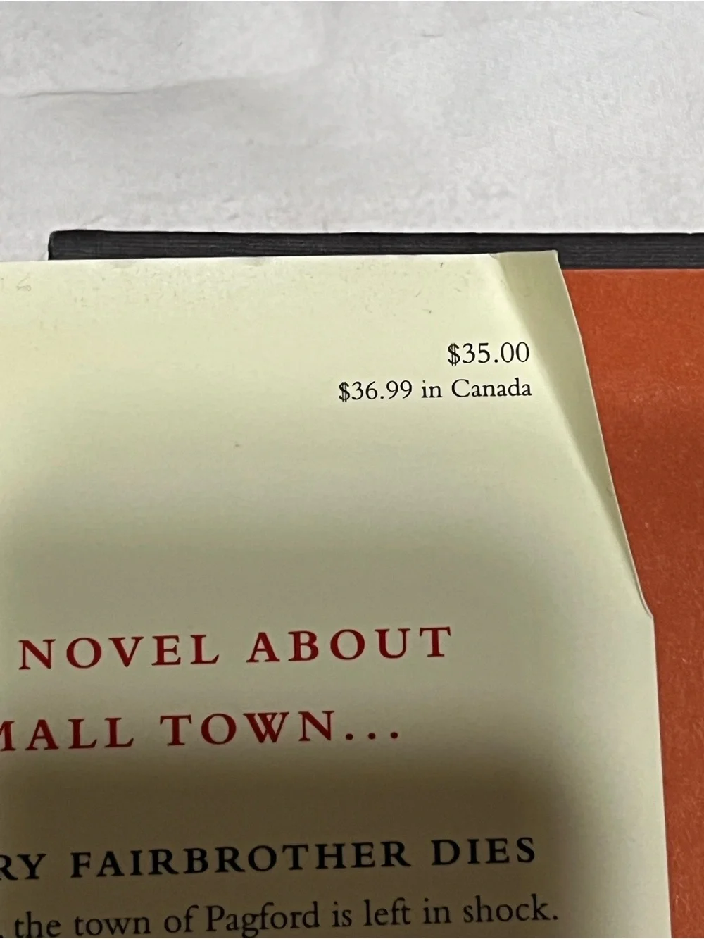 J.K. Rowling “The Casual Vacancy” Book - Hard Cover Red & Yellow